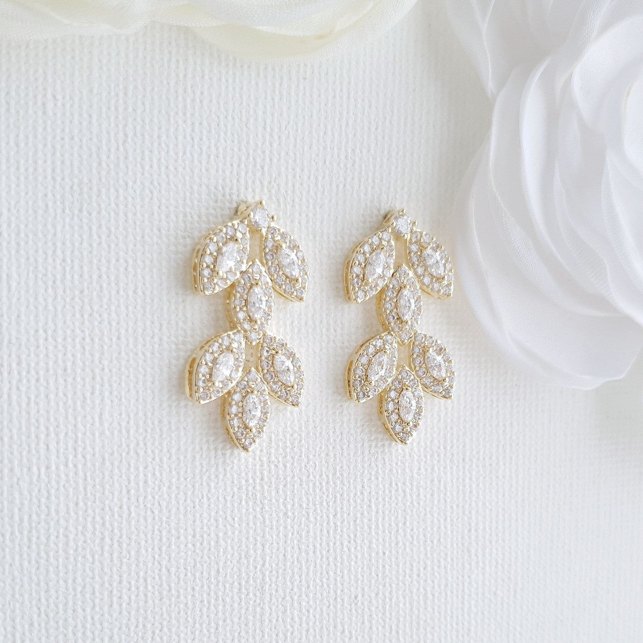 Gold leaf earrings deals studs